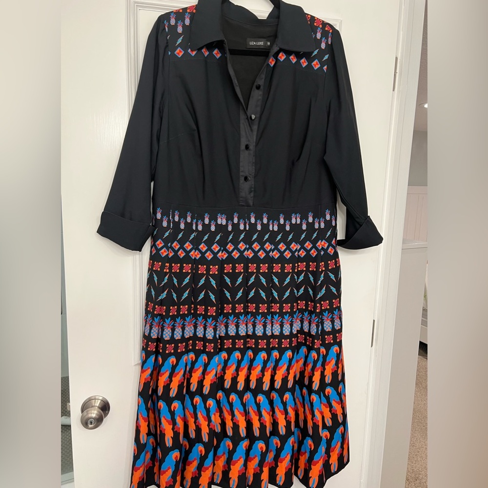 Black Parrot dress in 1X.